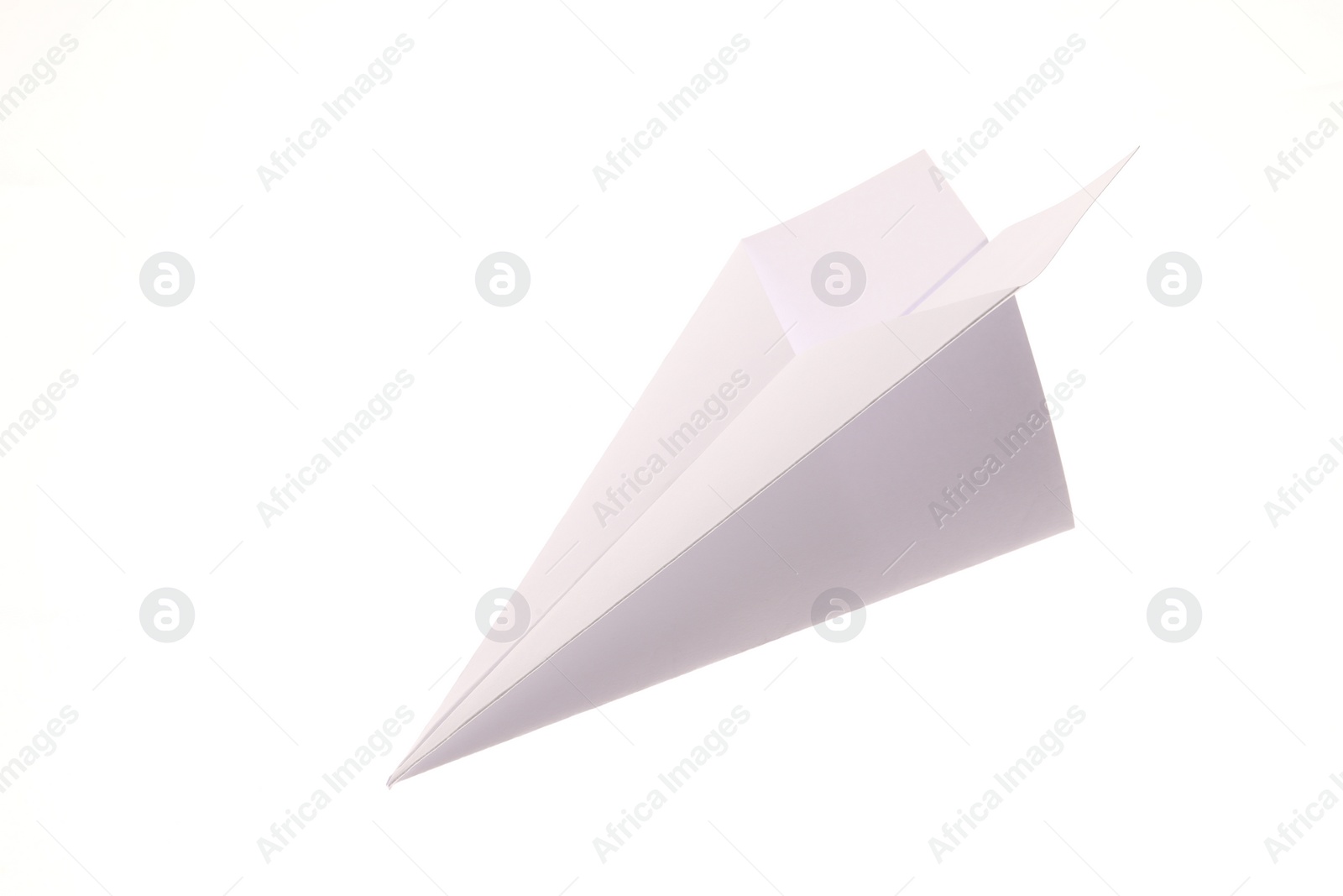 Photo of One handmade paper plane isolated on white