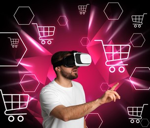 Image of Virtual shopping. Man using VR headset on color background