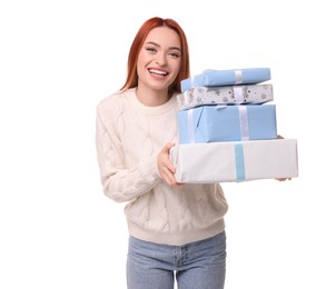 Young woman in sweater with Christmas gifts on white background