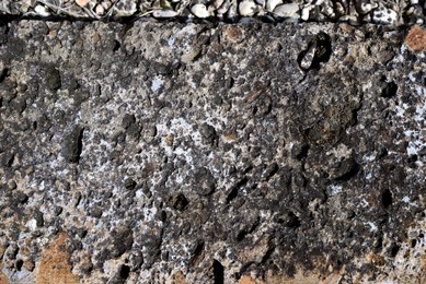 Texture of stone surface as background, top view