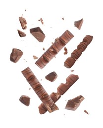 Image of Tasty chocolate bars falling on white background