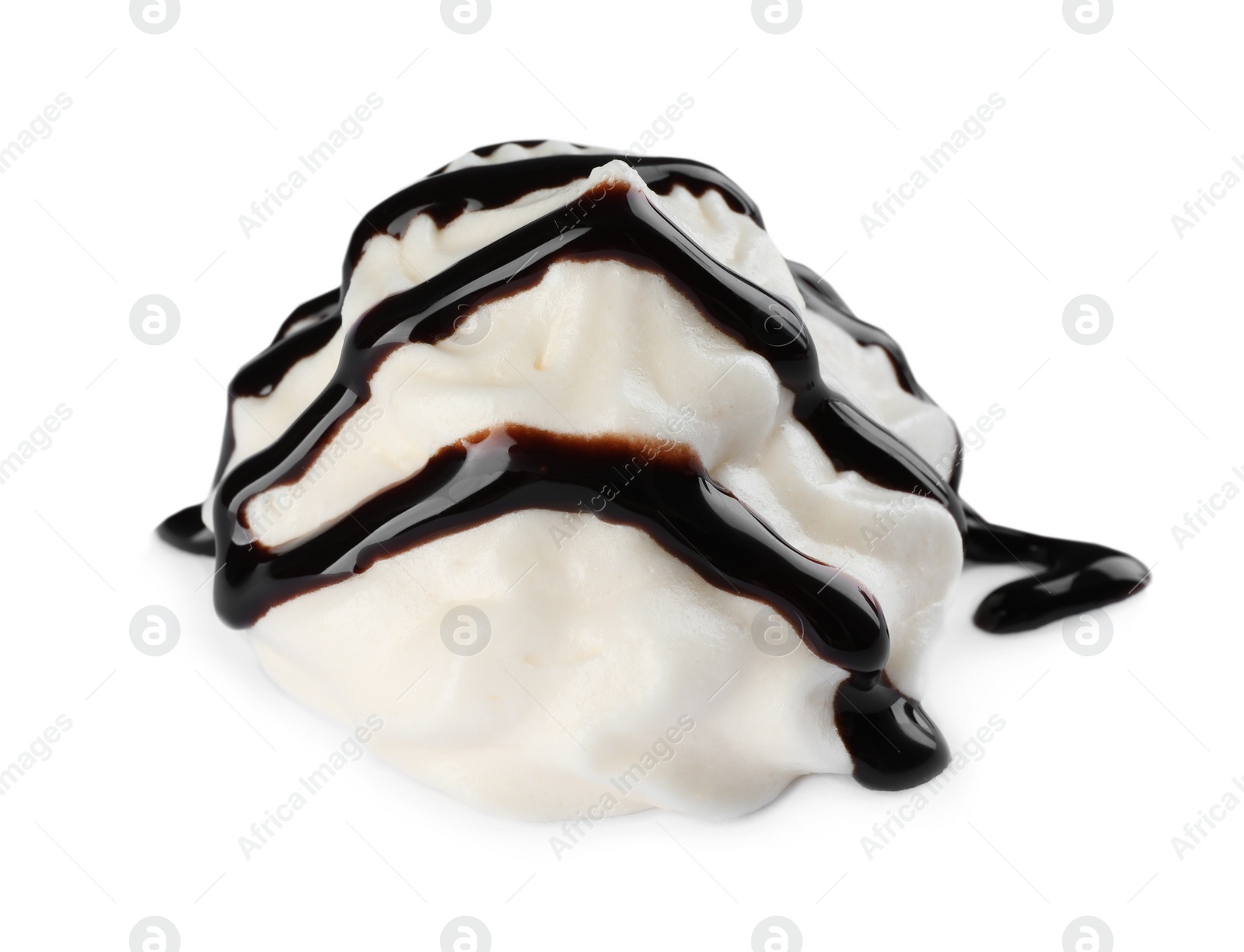 Photo of Delicious fresh whipped cream with chocolate syrup isolated on white