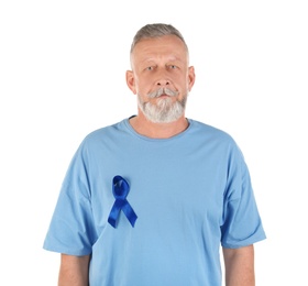 Mature man with blue ribbon on white background. Urological cancer awareness