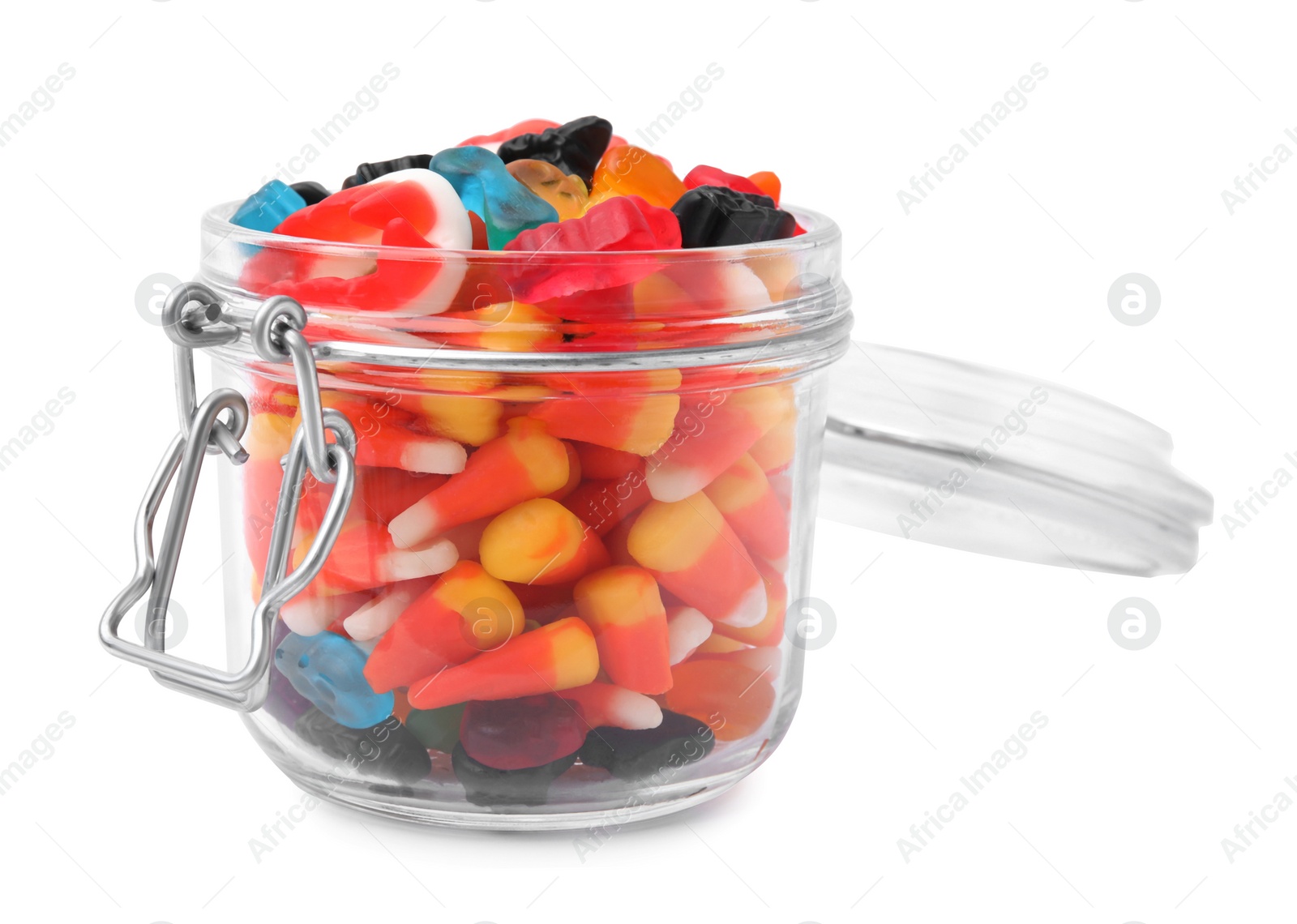 Photo of Jar of delicious colorful candies isolated on white. Halloween sweets