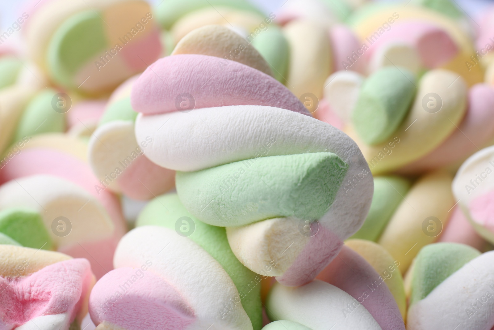 Photo of Delicious colorful marshmallows as background, closeup view