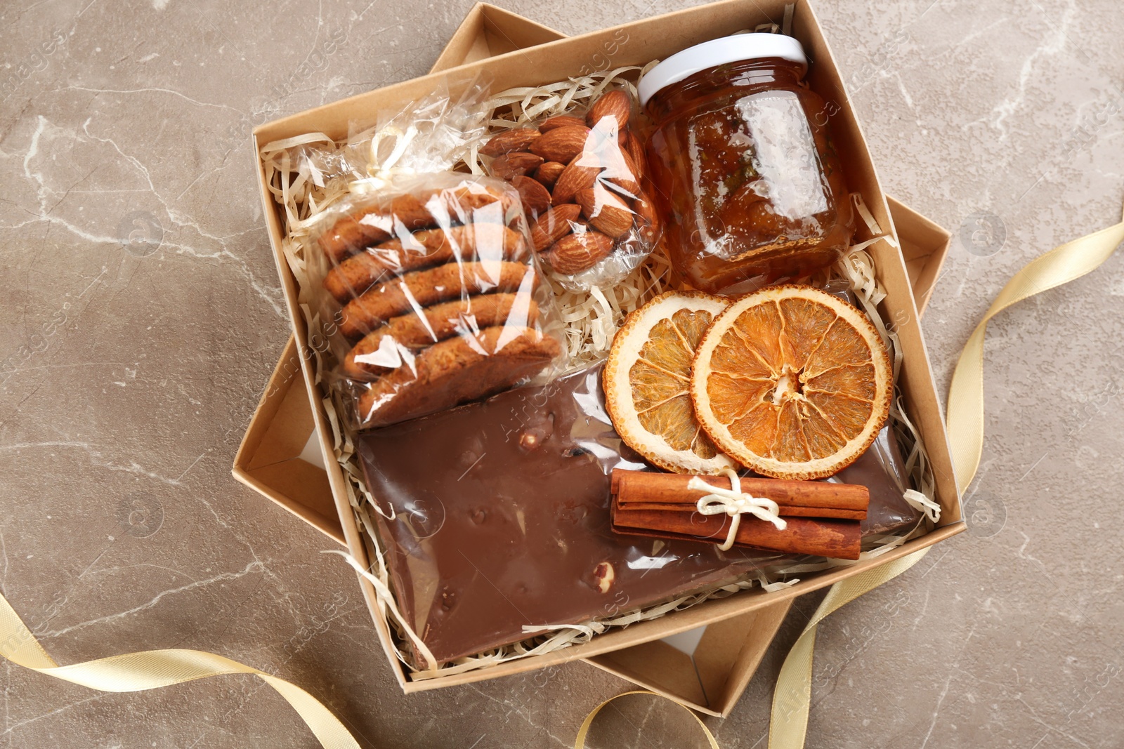 Photo of Stylish gift set on grey table, top view