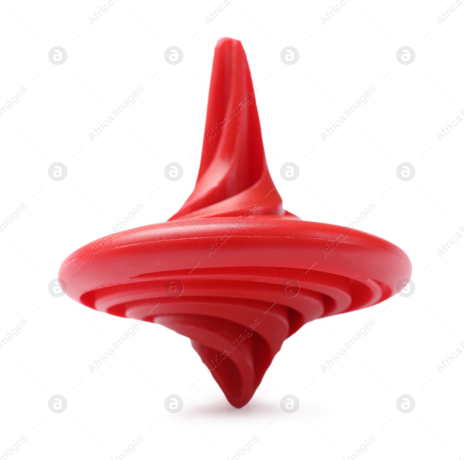 Photo of One red spinning top on white background