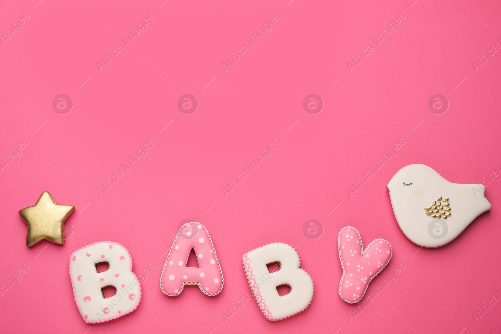 Photo of Word BABY made of tasty cookies on pink background, flat lay. Space for text