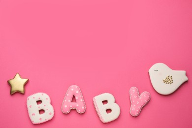 Word BABY made of tasty cookies on pink background, flat lay. Space for text