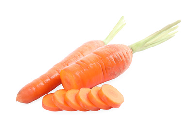 Photo of Whole and sliced ripe carrots isolated on white