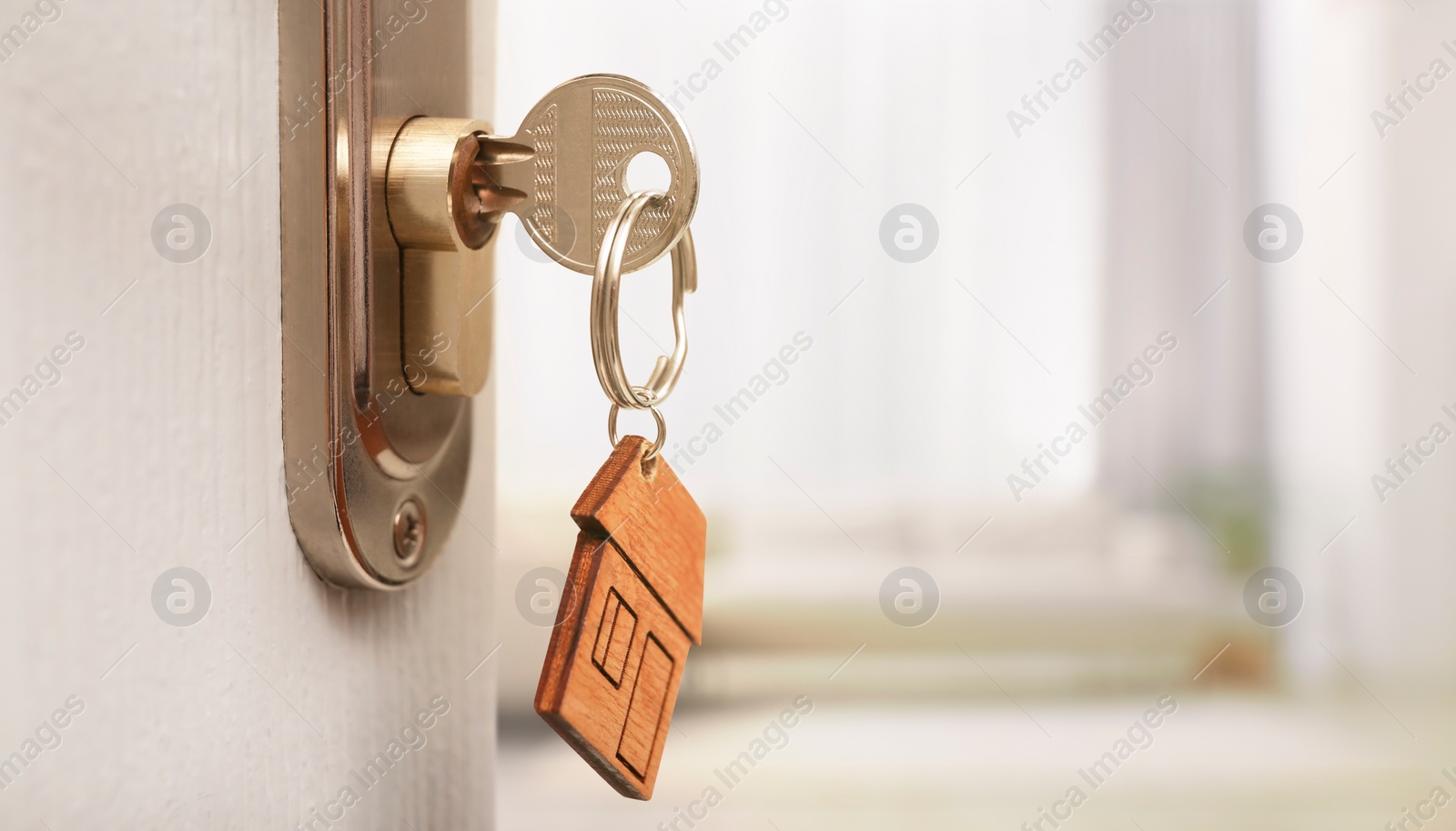 Image of Mortgage. Door with key open into room, space for text. Banner design