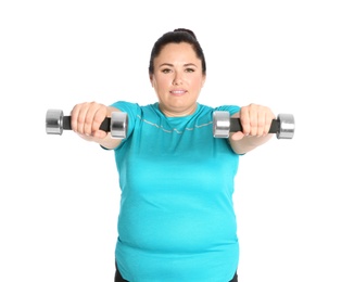 Photo of Overweight woman doing exercise with dumbbells on white background