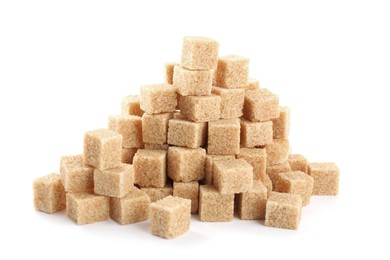 Photo of Pile of cubes with brown sugar on white background