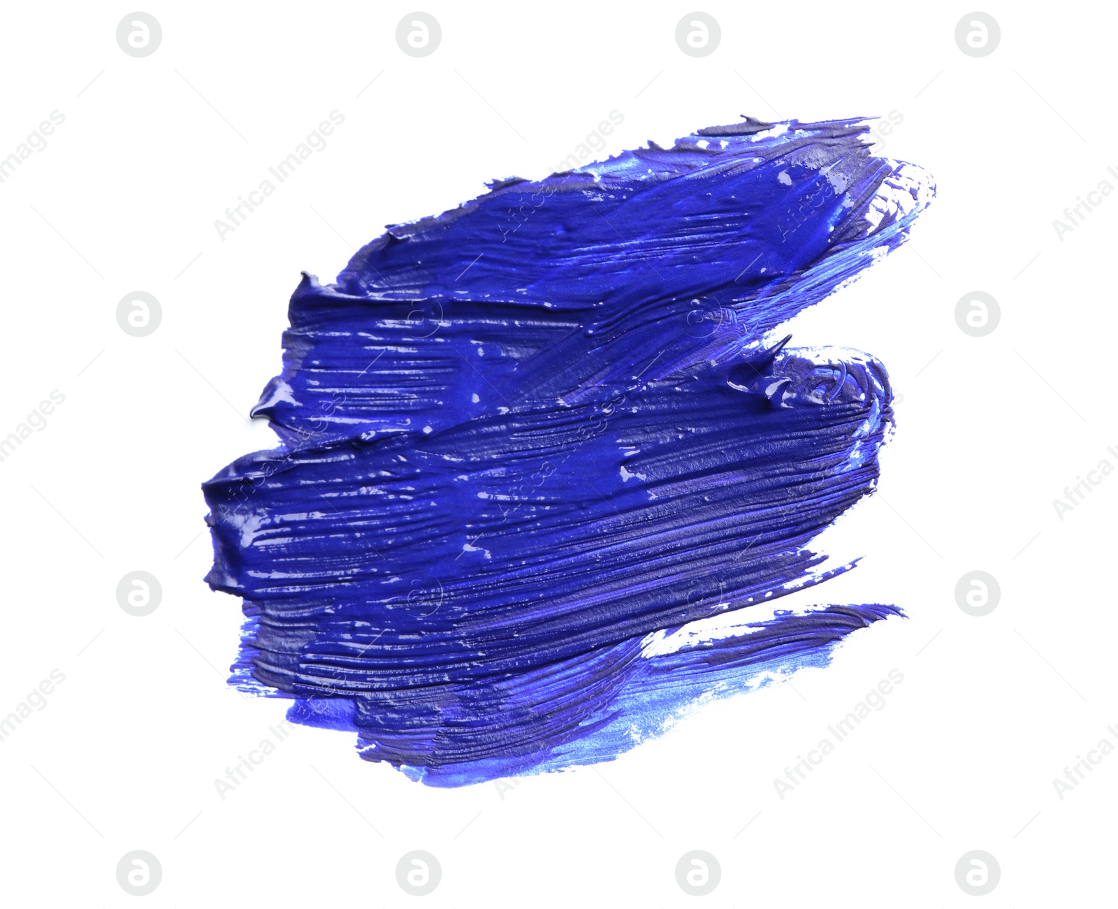 Photo of Abstract brushstroke of blue paint isolated on white