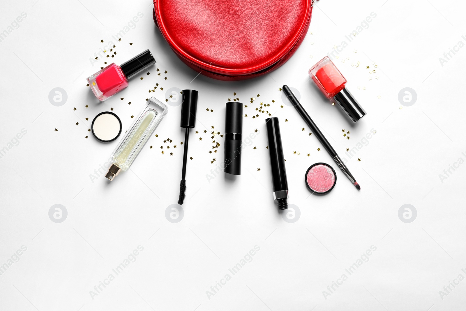 Photo of Makeup products with cosmetic bag on white background