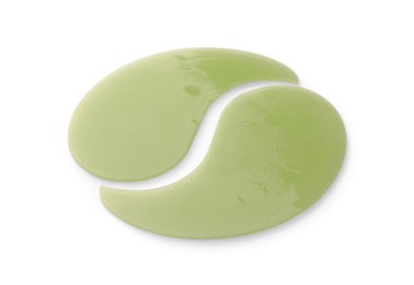 Pale green under eye patches isolated on white. Cosmetic product