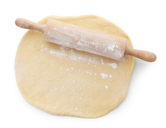 Raw dough and rolling pin isolated on white, top view