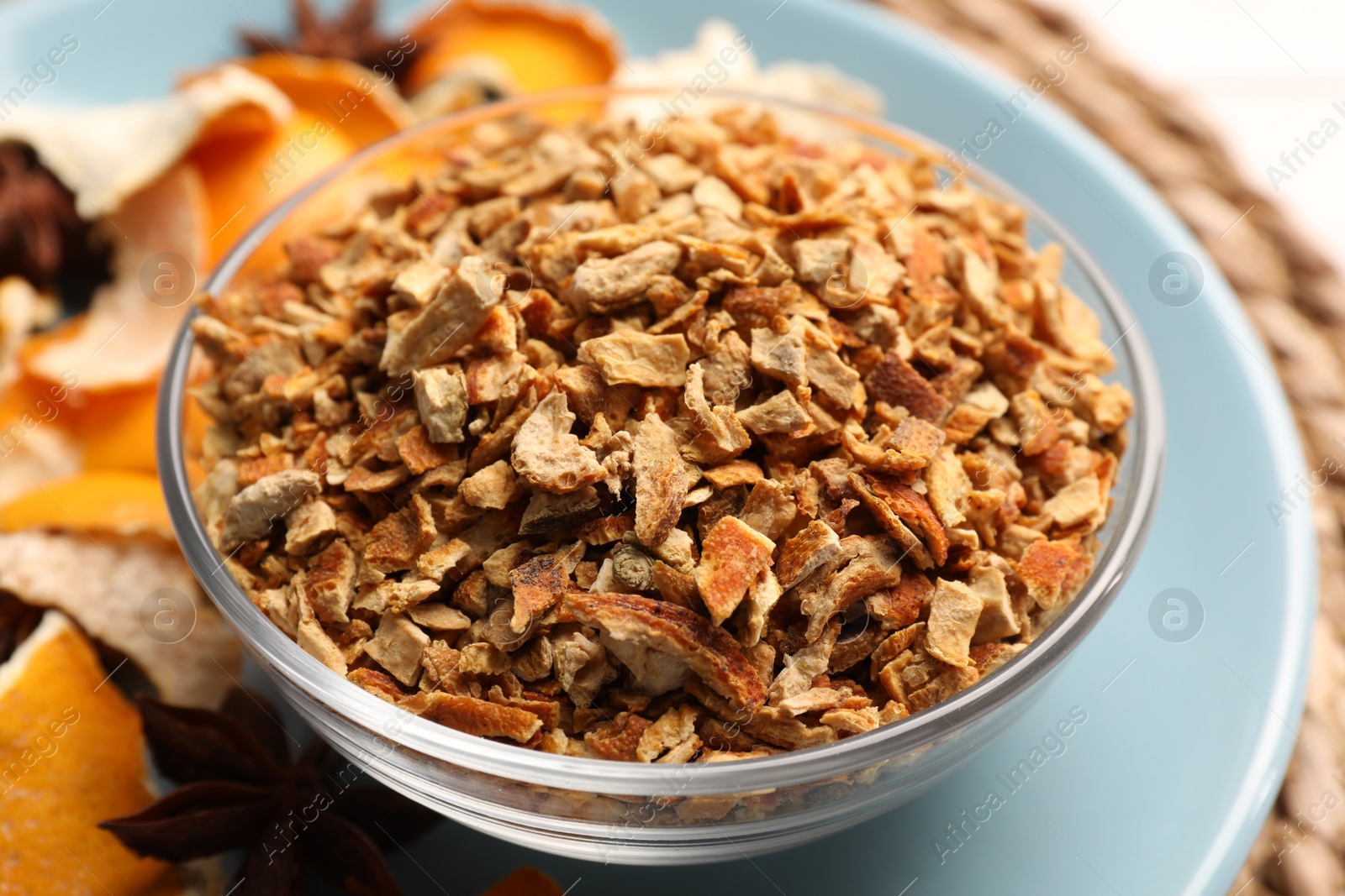 Photo of Bowl of dried orange zest seasoning, closeup