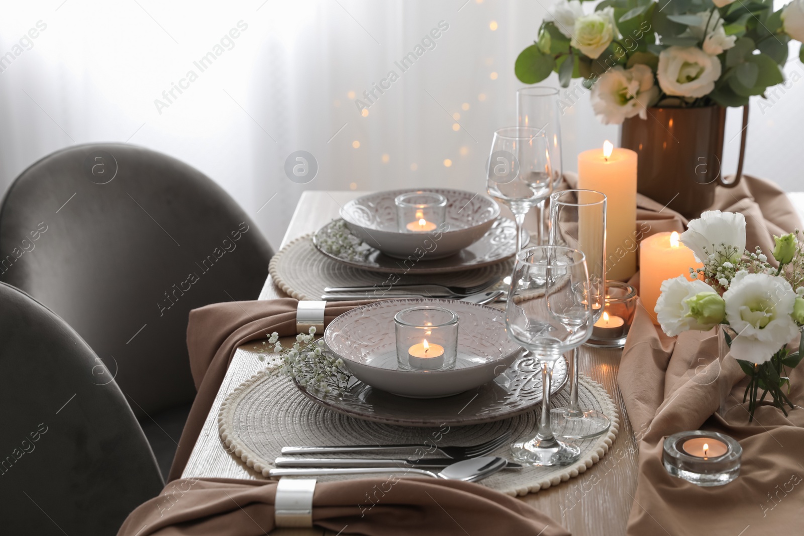 Photo of Festive table setting with beautiful floral decor in restaurant