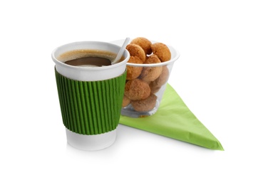 Photo of Aromatic coffee in takeaway paper with cardboard sleeve and tasty cookies on white background