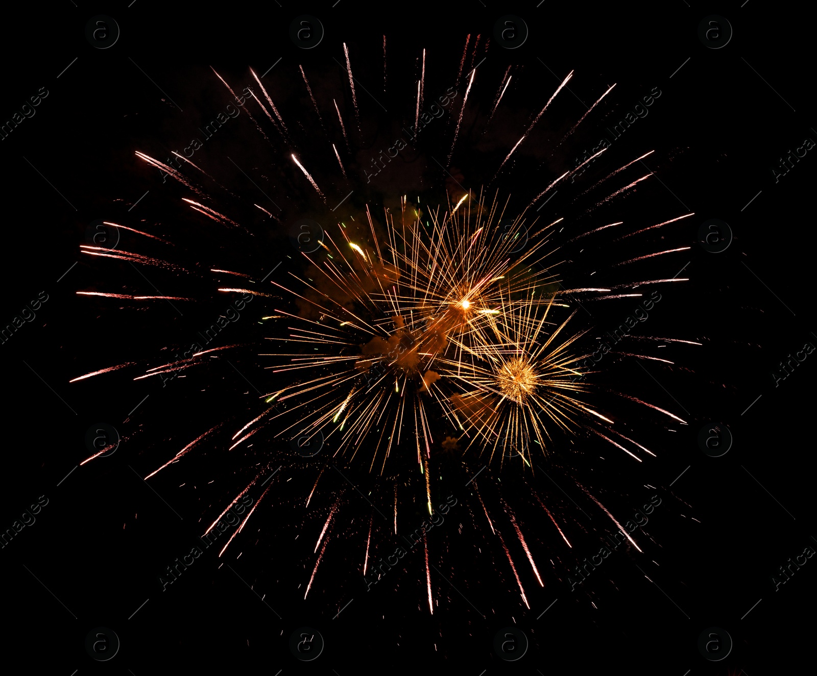 Image of Beautiful bright fireworks lighting up night sky