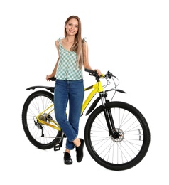 Photo of Happy young woman with bicycle on white background