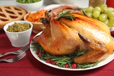 Delicious roasted turkey served on festive table