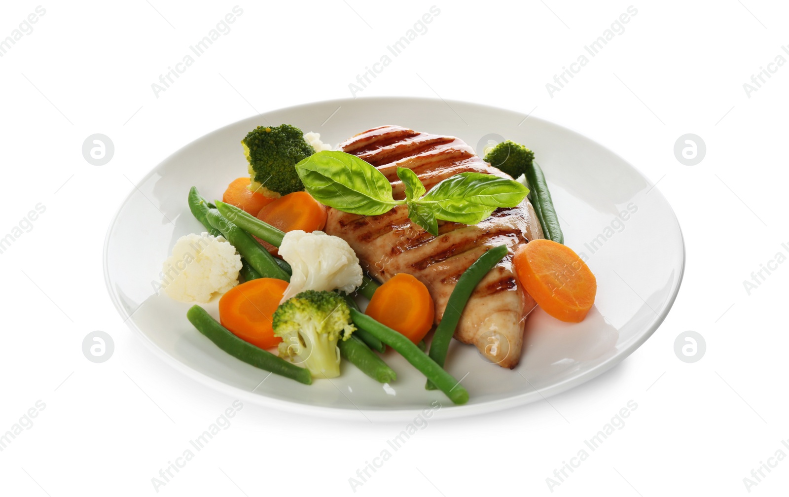 Photo of Tasty grilled chicken fillet with green basil and vegetables isolated on white