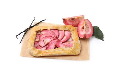 Photo of Delicious galette with apples and vanilla sticks isolated on white