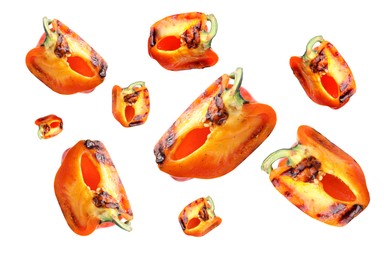 Image of Slices of grilled bell peppers in air on white background