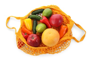 Photo of String bag with vegetables and fruits isolated on white, top view