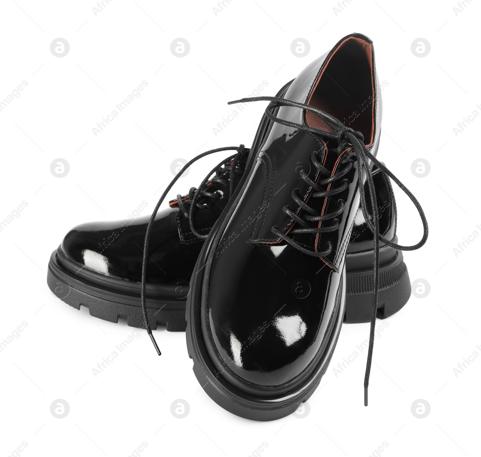 Photo of Pair of stylish shoes with laces on white background
