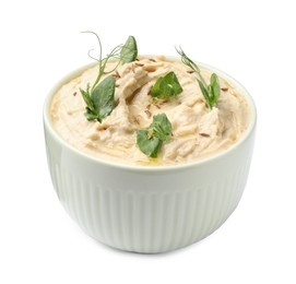 Bowl of tasty hummus with pea leaves isolated on white
