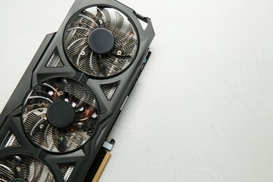 Photo of Computer graphics card on gray textured background, top view. Space for text