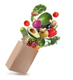 Image of Paper bag with vegetables and fruits on white background. Vegetarian food 