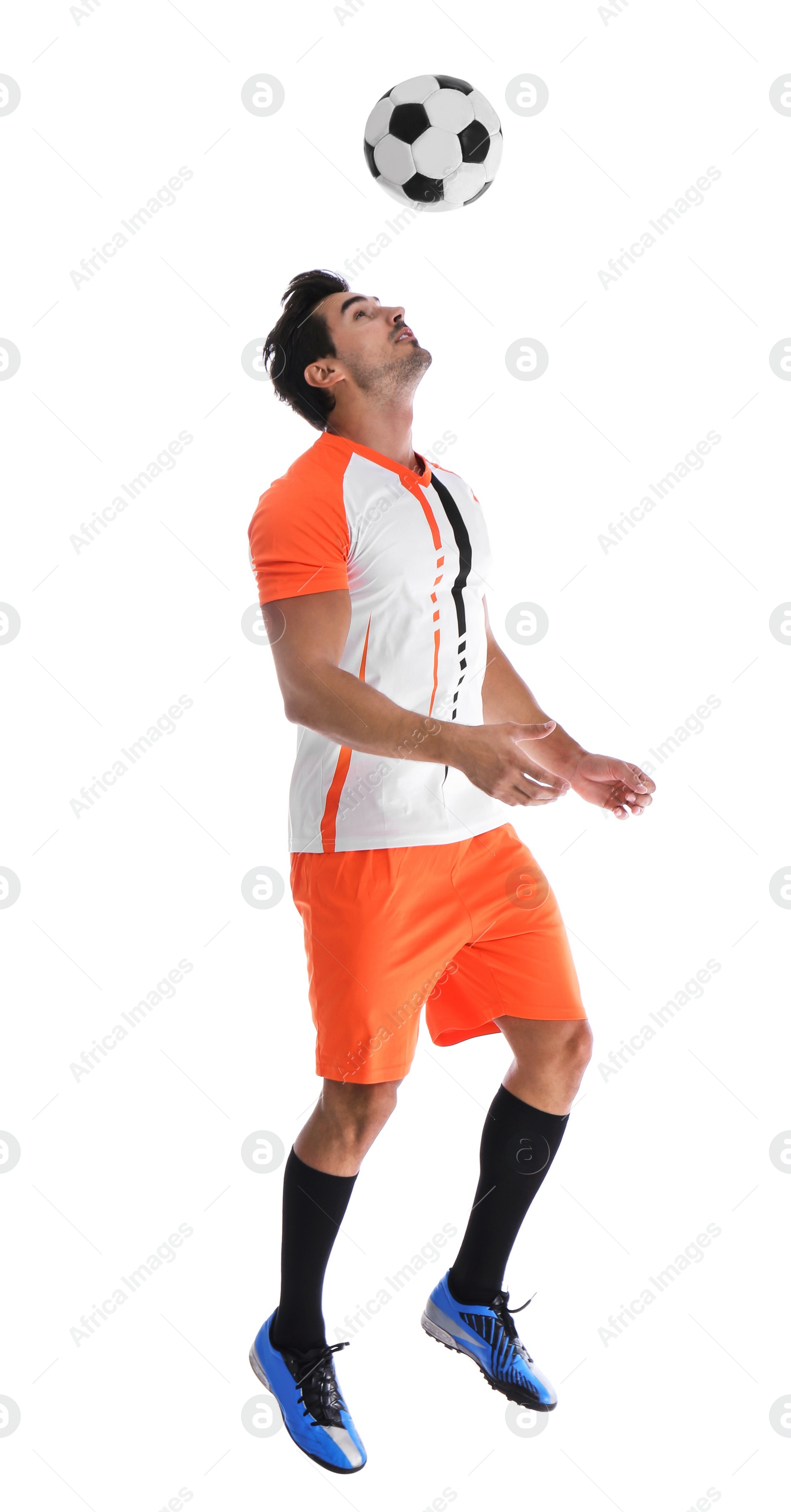 Photo of Young man playing football on white background