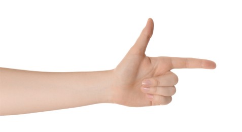 Photo of Woman pointing at something with index finger isolated on white, closeup