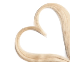 Photo of Heart made of blond hair locks on white background