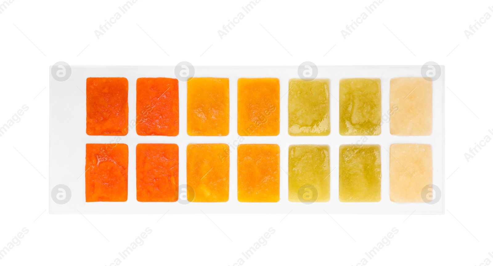 Photo of Different purees in ice cube tray isolated on white, top view. Ready for freezing