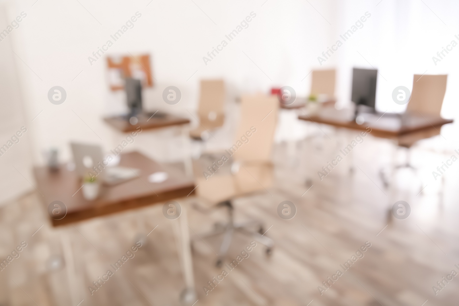 Photo of Modern brightly lit office with bokeh effect