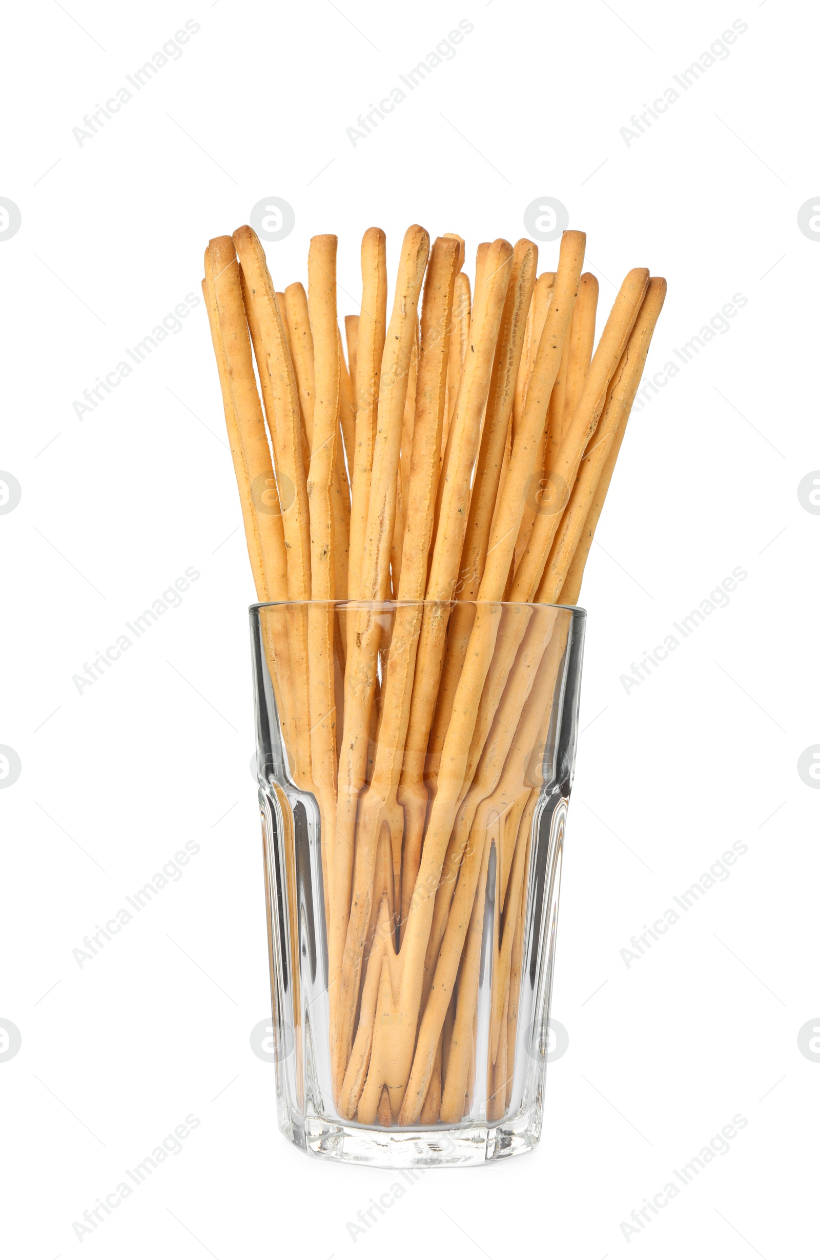 Photo of Delicious grissini sticks in glass on white background