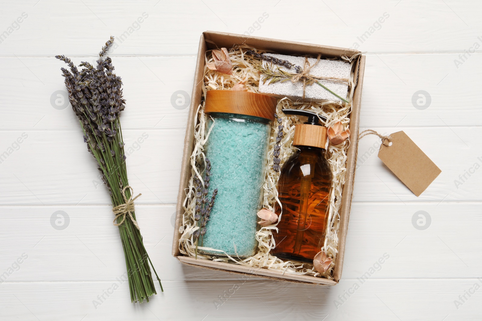 Photo of Spa gift set on white wooden table, flat lay