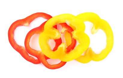 Photo of Rings of ripe bell peppers on white background, top view