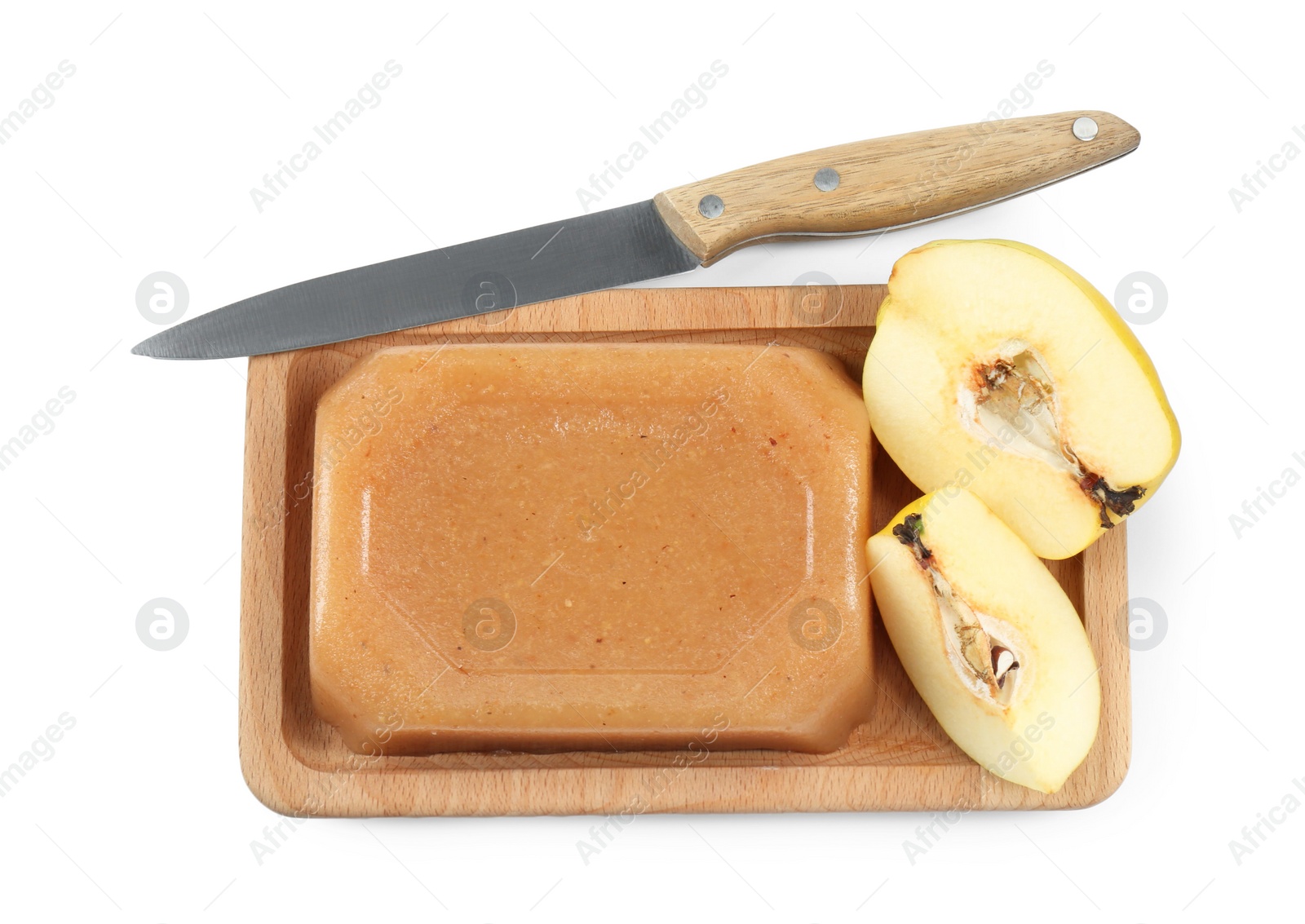 Photo of Delicious sweet quince paste, fresh fruit and knife isolated on white, top view