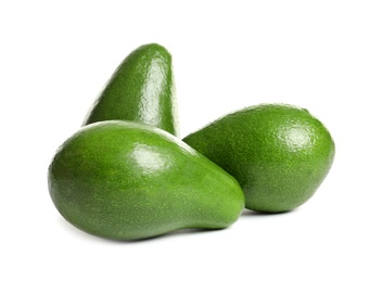 Ripe fresh avocados on white background