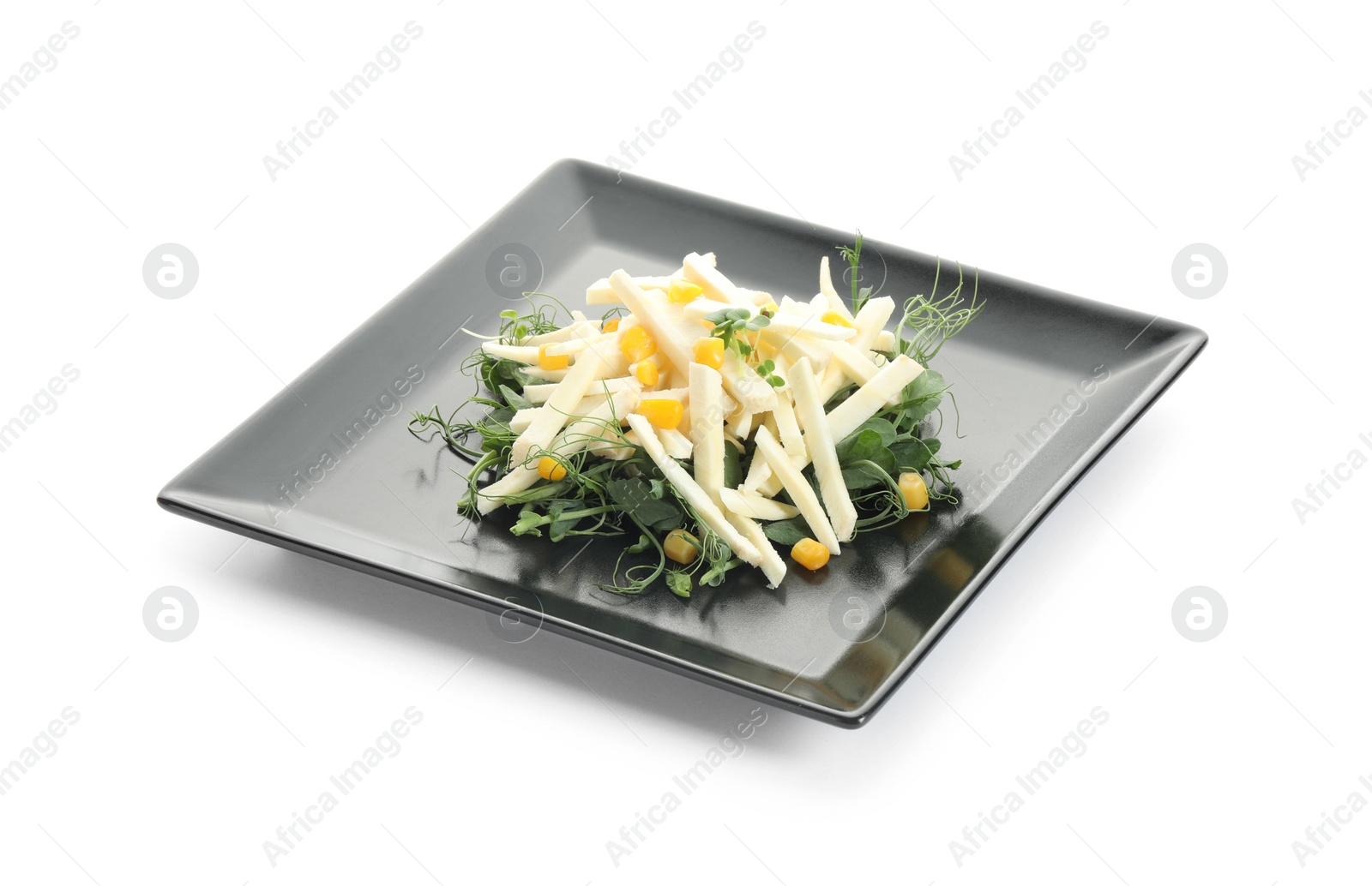 Photo of Delicious carrot salad with corn isolated on white