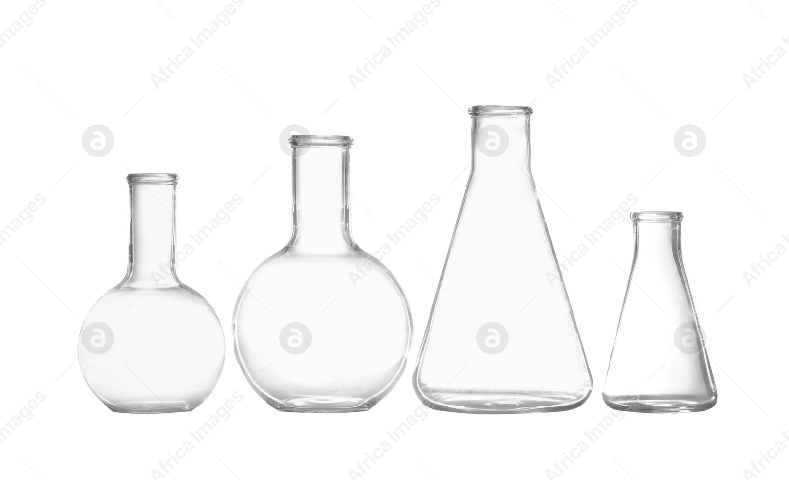 Photo of Group of empty chemistry glassware isolated on white