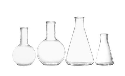 Group of empty chemistry glassware isolated on white