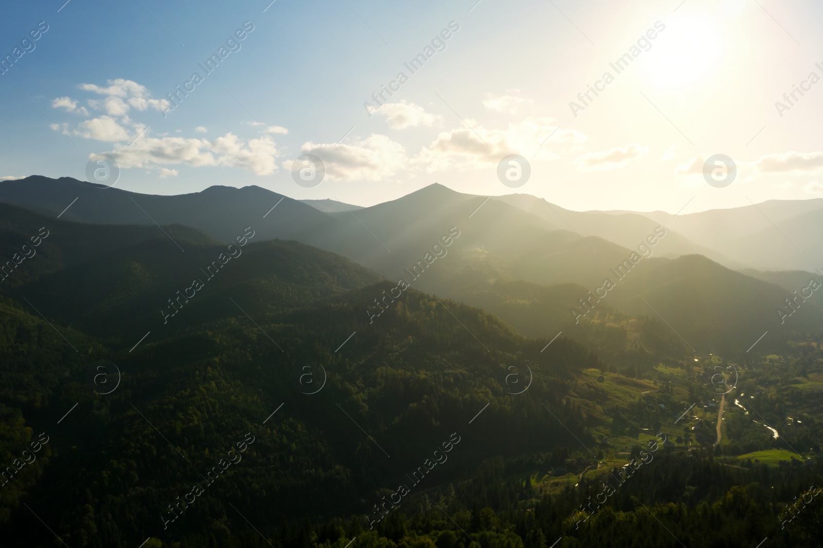 Image of Aerial view of beautiful mountain landscape with forest on sunny day. Drone photography