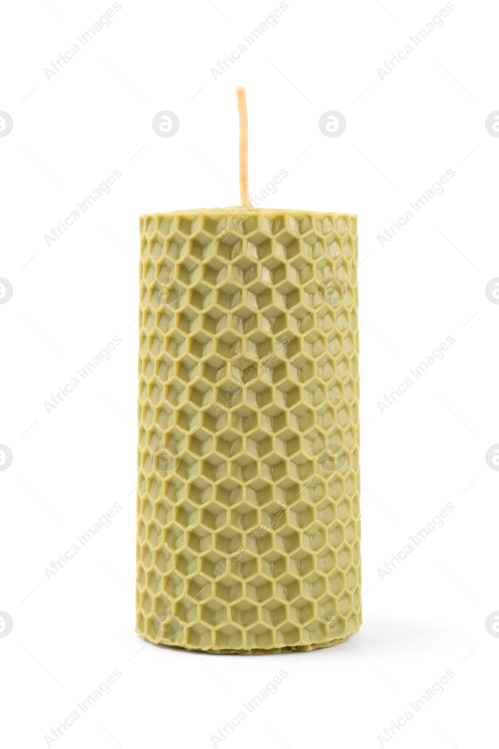 Photo of Stylish elegant beeswax candle isolated on white